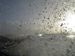 SX33692 Waves at Porthcawl lighthouse.jpg